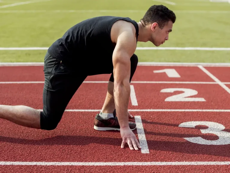 side-view-male-runner-sprinter-getting-ready-start-race copy